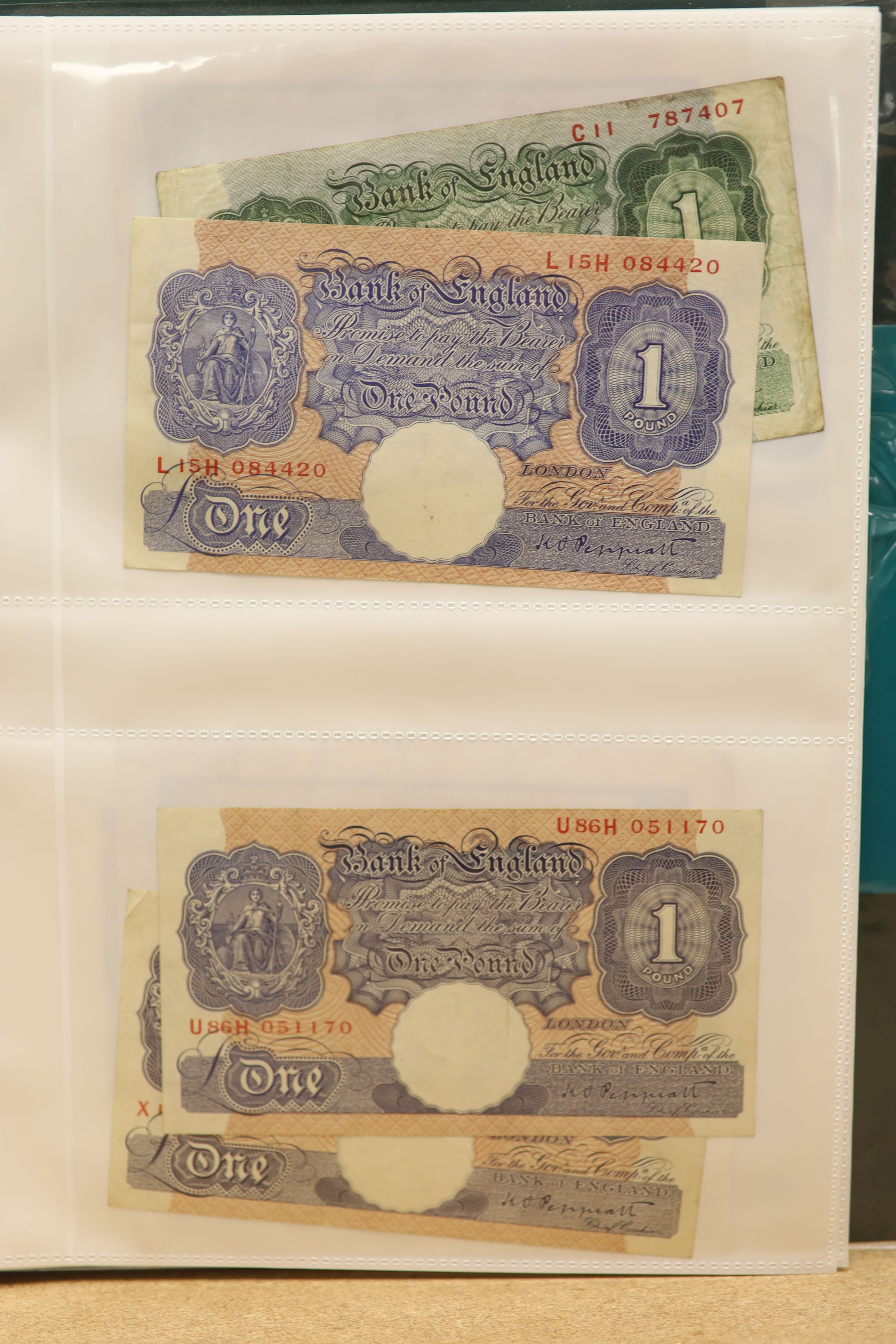 A collection of Bank of England and Scottish banknotes to include: 21 QEII 10 shillings, 14 O'Brien and Beale 10 shillings, 1 Peppiatt 10 shillings, 4 Hallam one pound notes, 18 O'Brien or Beale one pound notes, 8 Peppia